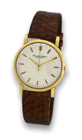 IWC - YELLOW GOLD.International Watch Co., Schaffhausen, No. 1779392, case.No. 1763702, Ref. R 1205. Made in the 1970's..Fine 18K yellow gold wristwatch..To be sold without reserve