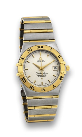 OMEGA - STEEL GOLD - CONSTELLATION.Omega, Constellation, Chronometer, Automatic.No. 80417842, Ref. DB 368.1201. Made circa 1995..Fine, tonneau-shaped, center seconds, self-winding, stainless.steel and 18K yellow gold wristwatch with date and a.stainless