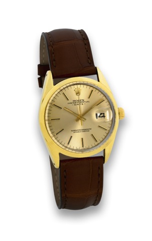 ROLEX - REF. 1550 - GOLD SHELL.Rolex, Oyster Perpetual Date, Superlative Chronometer.Officially Certified, case No. 3482962, Ref. 1550. Made in the.early 1970's..Fine, center seconds, self-winding, water-resistant, yellow.gold shell over stainless steel w