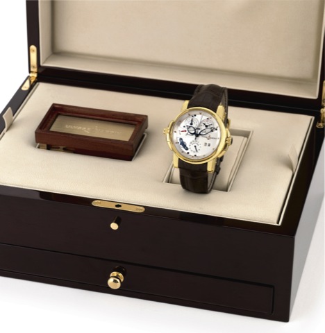 ULYSSE NARDIN - YELLOW GOLD - SONATA - DUAL TIME - ALARM.Ulysse Nardin, Le Locle, Swiss, Sonata Dual Time, No. 340, Ref. 676-88. Made circa 2006. Production of this reference.started in 2003..Very fine, rare and unusual, large, center seconds, two crowns,