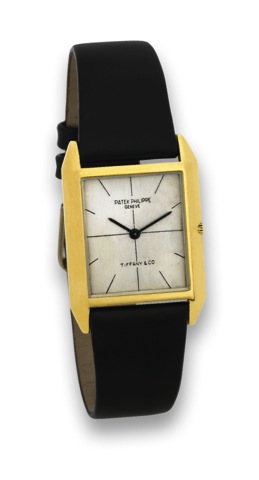 PATEK PHILIPPE _ REF. 3491 - TIFFANY CO..Patek Philippe, Geneve, movement No. 1131915, case.No. 2648791, Ref. 3491. Made circa 1966..Fine, rectangular, thin, 18K yellow gold wristwatch.