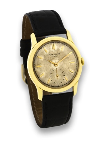 PATEK PHILIPPE - REF. 2449 - YELLOW GOLD.Patek Philippe Cie, No. 938532, case No. 670634.ef. 2449. Production of this reference started in 1948..Very fine and rare, 18K yellow gold wristwatch.