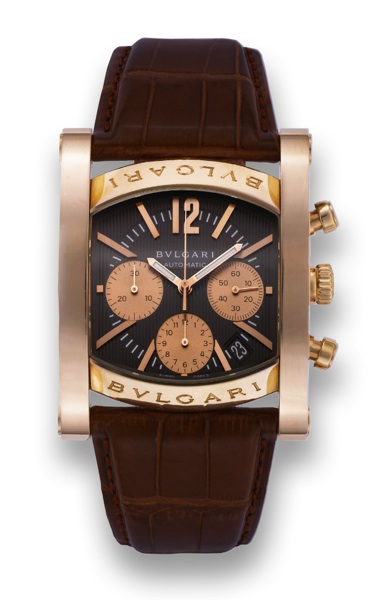 BULGARI PINK GOLD ASSIOMA CHRONOGRAPH.Bulgari, Assioma, No. 82/99, Ref. AAP48GCH L215. Made.in a limited edition of 99 examples, sold on March 9th, 2006..Fine and rare, large, curved quadrangular, self-winding.water-resistant, 18K pink gold wristwatch wit