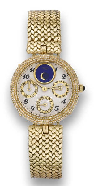 GERALD GENTA FOR FRED.Gerald Genta for Fred, Perpetual Calendar, Automatic.case No. G2644.4, Ref. 25070. Made in the 1980's..Fine, self-winding, 18K yellow gold and diamond wristwatch.with perpetual calendar, moon phases and an 18K yellow.gold integrated 