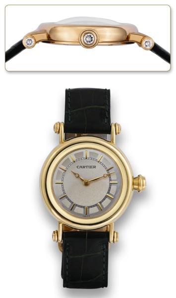 CARTIER, DIABLO GOLD DIAMONDS.Cartier, Diablo, case No. C 86198, Ref. 1461 0. Made.circa 2000..Fine and elegant, water-resistant, 18K yellow gold and.diamond lady