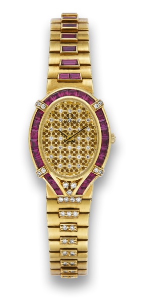 OMEGA DIAMOND RUBY DEVILLE.Omega, De Ville, case No. 47189464, Ref. BA8950020..Sold on June 18th, 2000..Very fine and elegant, oval, 18K yellow gold, diamond and.ruby, lady