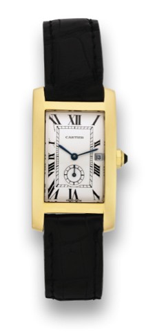 CARTIER, REF. 001839, TANK AMERICAINE.Cartier, Tank Americaine, Quartz, case No. 811905, Ref. 001839.Made in the 1990's..Fine, rectangular curved, quartz, water-resistant, 18K yellow gold wristwatch with date and an 18K yellow gold.Cartier deployant clasp