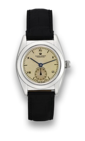 ROLEX, REF. 3135, OYSTER PERPETUAL.Rolex, Oyster Perpetual, Chronometre, case No. 124X02, Ref. 3135..Very fine, tonneau shaped, water resistant, self-winding, stainless steel wristwatch.