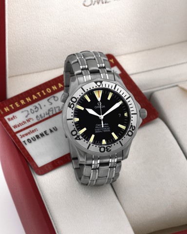 OMEGA REF. 2031.50, SEAMASTER 1000 TITANIUM.Omega, Seamaster Professional Chronometer, 300 m/1000 ft.No. 80149120, Ref. 2031.50. Sold on January 13, 1998..Fine, center seconds, self winding, water resistant to.300m/1000ft, titanium diver