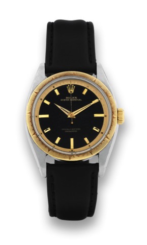 Rolex, Oyster Perpetual, Officially Certified Chronometer,.Ref. 6582. Made in 1957..Very fine and rare, center seconds, self-winding, waterresistant.stainless steel and 18K yellow gold wristwatch.