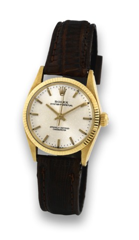 ROLEX REF. 6551 MIDSIZE YELLOW GOLD.Rolex, Oyster Perpetual, Officially Certified Chronometer.case No. 1345564, Ref. 6551. Made circa 1959..Fine, centre second, self-winding, water-resistant, 14K yellow.gold midsize wristwatch.