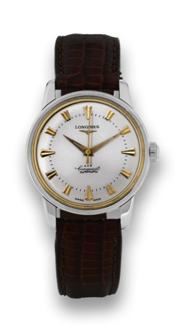 LONGINES REF. 9000 STEEL CONQUEST.Longines, Conquest, Automatic, movement No. 10223360, case 549, Ref. 9000-10. Made in the 1960s..Fine, center seconds, water resistant, self-winding, stainless steel wristwatch with a stainless steel Longines buckle.