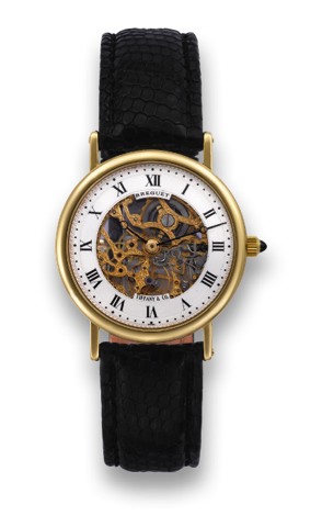 BREGUET SKELETON RETAILED BY TIFFANY CO..Breguet, Skeleton, case No. 2469, retailed by Tiffany Co..Made in the 1990's..Fine and elegant, thin, skeletonized, 18K yellow gold.wristwatch with an 18K yellow gold buckle.