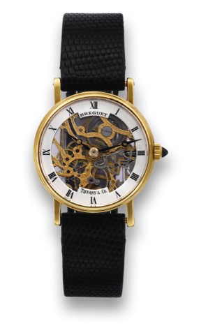 BREGUET SKELETON RETAILED BY TIFFANY CO..Breguet, Skeleton, case No. 2215, retailed by Tiffany Co..Made in the 1990's..Fine and elegant, thin, skeletonized, 18K yellow gold ladies.wristwatch with an 18K yellow gold buckle.