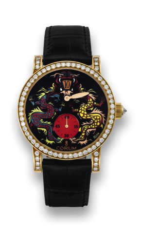CORUM REF. 154.201.65 ENAMEL CHINESE.DRAGON JUMP HOUR YELLOW GOLD.Corum, Artisan Classical Chinese Dragon, No. 13/50, No..1001792, Ref. 154.201.65. Made in a limited edition of 50.pieces, circa 2000..Extremely fine and rare self-winding, jump-hour 18K yel