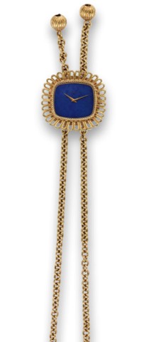 PIAGET LAPIS LAZULI AND GOLD NECKLACE.Piaget, No. 223823, Ref. 9431P81. Made in the 1980s..Very fine, rare and elegant, 18K yellow gold and lapis lazuli.pendant watch with integral 18K yellow gold twisted-link.necklace.