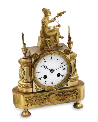 THE YARN WINDER.Samuel Marti, Paris, No. 1676. Made circa 1900..Fine, small, Empire-style, gilt-bronze 8-day going mantel clock.with hour and half-hour striking.