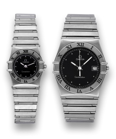 OMEGA STEEL CONSTELLATION.Omega, Constellation, No. 976001, Ref. 795.1080. Made.circa 2000..Fine, tonneau-shaped, quartz, stainless steel lady's wristwatch.with a stainless steel bar-link bracelet with concealed steel clasp..C. Three-body, solid, polished