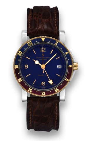 GIRARD-PERREGAUX REF. 7200 TRAVELLER 7000.STEEL AND YELLOW GOLD.Girard-Perregaux, Automatic, Traveller 7000, No. B-638.Ref. 7200. Made in the 1990's..Fine, two time zone, self-winding, water-resistant, stainless.steel and yellow gold wristwatch with cente