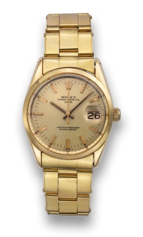 ROLEX REF. 1550 GOLD SHELL DATE.Rolex, Oyster Perpetual Date, Superlative Chronometer.Officially Certified, case No. 3108208, Ref. 1550. Made in the.late 1970's..Fine, center seconds, self-winding, water-resistant, yellow.gold shell over stainless steel w