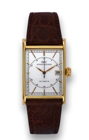 IWC REF. 3226 NOVECENTO YELLOW GOLD.International Watch Co., Schaffhausen, Novecento Automatic.case No. 2671537, Ref. 3226. Made in the 1990s..Fine, rectangular, self-winding, 18K yellow gold wristwatch.with date and an 18K yellow gold IWC buckle.