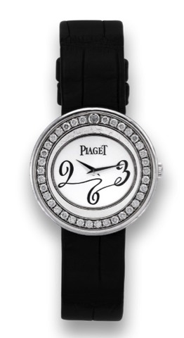 PIAGET REF. 10275 POSSESSION.Piaget, Possession, No. 947264, Ref. 10275..Fine quartz 18K white gold and diamond wristwatch with stainless steel Piaget buckle.