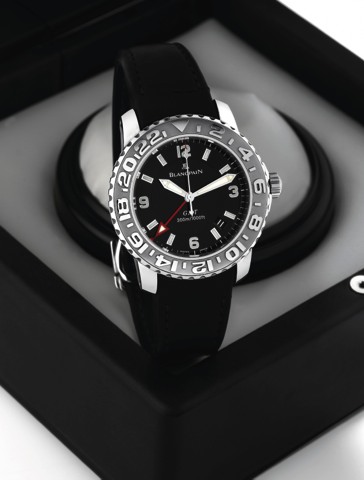 BLANCPAIN GMT STAINLESS STEEL.Blancpain, GMT, No. 488, Ref.2250. Made in the 2000s..Fine, center-seconds, self-winding, water-resistant, two time.zone, stainless steel wristwatch with date and a stainless.steel Blancpain deployant clasp. Accompanied by fi