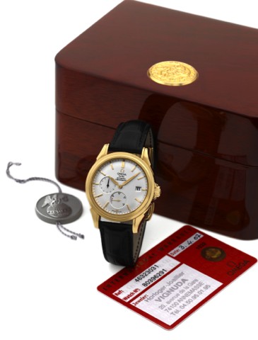 OMEGA DE VILLE, YELLOW GOLD.Omega, DeVille Co-Axial R_serve de Marche, Automatic.Chronometer, case No. 80396291, Ref. 46323031. Sold on.April 3rd, 2007..Very fine, self-winding, water-resistant, 18K yellow gold.wristwatch with date, 44-hour power reserve 