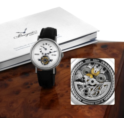 BREGUET TOURBILLON, PLATINUM.Breguet, Tourbillon , No. 3227, Ref. 5307. Sold on February 16th, 2005..Very fine and rare, large, skeletonized, self-winding, platinum wristwatch with visible.one-minute tourbillon regulator, regulator dial and a platinum Bre