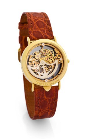 ULYSSE NARDIN, REF.141 28, SKELETONIZED.INVERTED DIAL.Ulysse Nardin, Locle, Suisse, No. 041, Ref.141 28. Made in.the 1990s..Fine, rare and unusual, skeletonized, self-winding 18k yellow.gold wristwatch with hinged inverted dial and a gold-plated.Ulysse Na