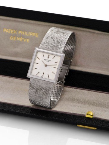 PATEK PHILIPPE, REF. 3490.WHITE GOLD.Patek Philippe, Genève, movement No..1133788, case No. 2646672, Ref. 3490/1..Made circa 1965..Very fine and thin, square, 18K white.gold wristwatch with an 18K white gold.linen-textured Patek Philippe bracelet..Accompa