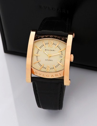 BULGARI REF. AA48G PINK.GOLD ASSIOMA.Bulgari, Assioma, No. L 0038, Ref..AA 48G. Made circa 2006..Fine, large, curved quadrangular.self-winding, water-resistant, 18K pink.gold wristwatch with date and an 18K.pink gold Bulgari double deployant.clasp. Accomp