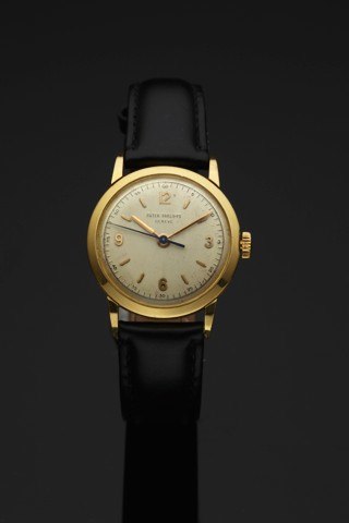 PATEK PHILIPPE REF. 2466 YELLOW GOLD.Patek Philippe, Genève, movement No. 702085, case.No. 674460, Ref. 2466. Made in 1953..Very fine and rare, center seconds, 18K yellow gold.wristwatch.