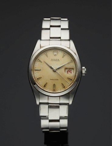 ROLEX REF. 6494 OYSTERDATE STEEL.Rolex, Oysterdate, Precision, case No. 394491, Ref. 6294..Made in 1958..Fine and very rare, center seconds, water-resistant, stainless.steel wristwatch with date and a stainless steel Oyster.bracelet..To be sold without re