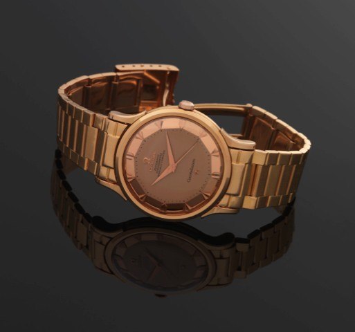 OMEGA REF. 2648 CONSTELLATION PINK GOLD.Omega, Automatic Chronometer, Officially Certified.Constellation, No. 14225337, case No. 11359677, Ref. 2648..Made in 1953..Fine, center seconds, self-winding, 18K pink gold.chronometer wristwatch with an 18K yellow