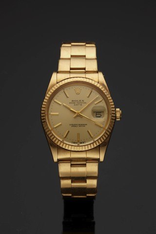 ROLEX REF. 15038 DATE YELLOW GOLD.Rolex Oyster Perpetual, Date, Superlative Chronometer.Officially Certified, case No. 8862254, Ref. 15038. Made circa.1985..Fine, center seconds, self-winding, water-resistant, 18K yellow.gold wristwatch with date and an 1