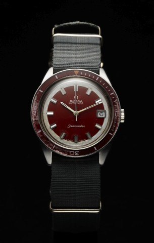 OMEGA REF. 166.010 SEAMASTER RED BAKELITE.BEZEL STEEL.Omega, Seamaster, Automatic, No. 28967841, Ref. 166.010..Made circa 1969..Fine and very rare, center seconds, self-winding, waterresistant.stainless steel wristwatch with date, red bakelite.bezel and d