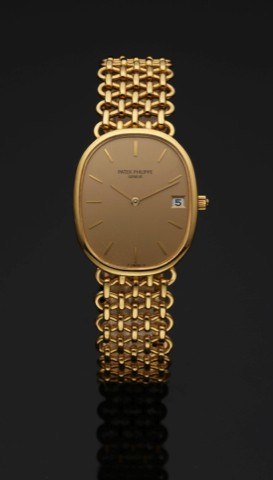 PATEK PHILIPPE REF. 3788 GOLDEN ELLIPSE.QUARTZ YELLOW GOLD.Patek Philippe, Genève, Golden Ellipse, No. 1581836, case.No. 2805071, Ref. 3788/1. Made in the late 1980s..Fine, oval, 18K yellow gold quartz wristwatch with date and.an integral 18K yellow gold 