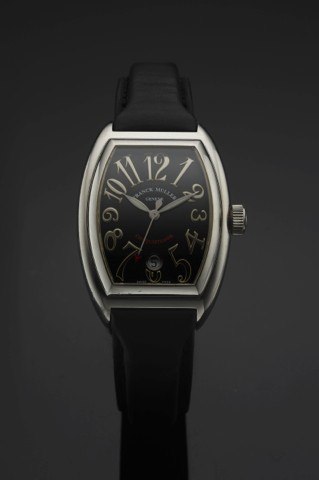 FRANCK MULLER REF. 8002 SC CONQUISTADOR.STEEL.Franck Muller, Genève, Conquistador, No. 43, Ref. 8002 SC..Made circa 2000. Fine, large, tonneau-shaped and curved.center seconds, self-winding, water-resistant, stainless steel.wristwatch with date and a stai