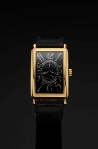 FRANCK MULLER REF. 1100 DS R LONG ISLAND.DOUBLE RETRO-SECONDS YELLOW GOLD.Franck Muller, Genève, Long Island – Double Retrograde.Seconds, No. 228, Ref. 1100 DS R. Made in the 2000s..Very fine, large, rectangular curved, self-winding, water.resistant, 18K 