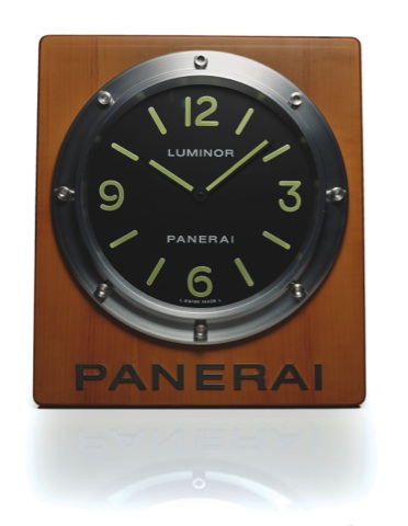 PANERAI DEALER CLOCK.Officine Panerai, Firenze 1860.Ref. PAM 00174. Made in 2006..Fine wall clock with quartz movement..To be sold without reserve