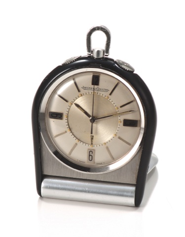 LECOULTRE MEMOVOX TRAVEL.ALARM CLOCK STEEL AND LACQUER.LeCoultre, Memovox, case No. 1218721..Made in the 1960’s..Fine steel and black lacquer travel clock with alarm..To be sold without reserve