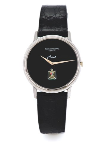 Patek Philippe Ref 3590.For Iraq White Gold.Patek Philippe, Genève, No. 1285036, case No. 2754599.Ref. 3590, Sold on January 1981..Very fine and rare,thin, self-winding, 18K white gold.wristwatch with an 18K white gold patek philippe buckle..Accompanied b