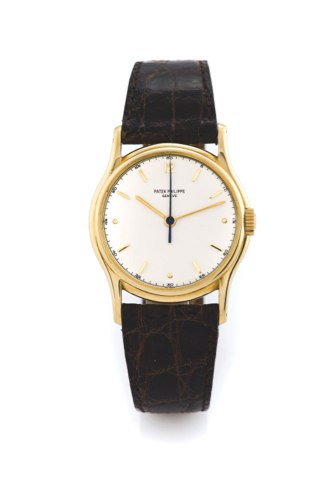 PATEK PHILIPPE REF. 1527.Patek Philippe, Genève, movement No. 864815, case No. 647922, Ref. 1527. Made in.1940, sold on september 23rd, 1947. Accompanied by the extract from the archives..Very fine, 18k yellow gold center-seconds wristwatch with an 18k ye