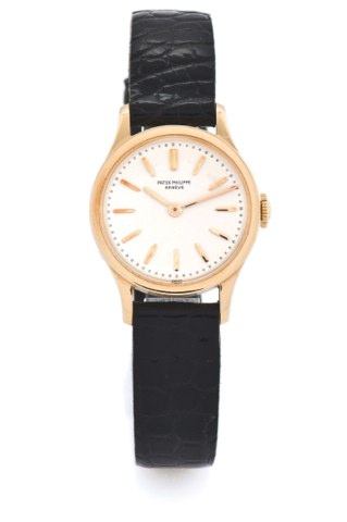 PATEK PHILIPPE REF. 3148 CALATRAVA PINK GOLD.Patek Philippe Cie, Genève, Calatrava, No. 854803, case No..305164, Ref. 3148. Made circa 1955..Elegant and very rare 18K pink gold wristwatch with an 18K.pink gold Patek Philippe buckle.