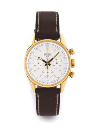 HEUER CARRERA GOLD RE-EDITION.Heuer Carrera Chronograph, Carrera, 1964 re-edition, movement No. 4508111, case No. 0518, Ref. CS3140. Made in a numbered series circa 1996, sold in May 1999..Fine, water resistant, 18K yellow gold wristwatch with round butto