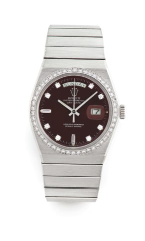 ROLEX, REF. 1831 PLATINUM DAY-DATE, STELLA.DIAL, NO. 05, ONE OF EIGHT EVER PRODUCED.Rolex, Oyster Perpetual, Day-Date, Superlative Chronometer.Officially Certified, case No. 5086932, Ref. 1831. Sold in 1977.to Iran..Fine and very rare, tonneau-shaped, cen
