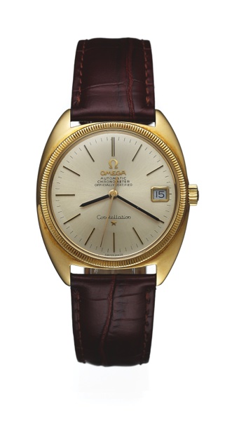 OMEGA REF. 168027.CONSTELLATION YELLOW GOLD.Omega, Constellation, Automatic, Chronometer, Officially.Certified, No. 26411521, Ref. 168027. Made in 1968..Fine and rare, tonneau-shaped, water-resistant, center.seconds, self-winding, 18K yellow go