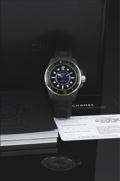 CHANEL J12 MARINE STEEL PVD COATED.Chanel, J12 Marine, Automatic 300M, Ref. S.G. 97190..Made in 2009, sold November 29th, 2010..Very fine, curved, center seconds, self-winding, waterresistant.stainless steel PVD-coated and ceramic.wristwatch wi