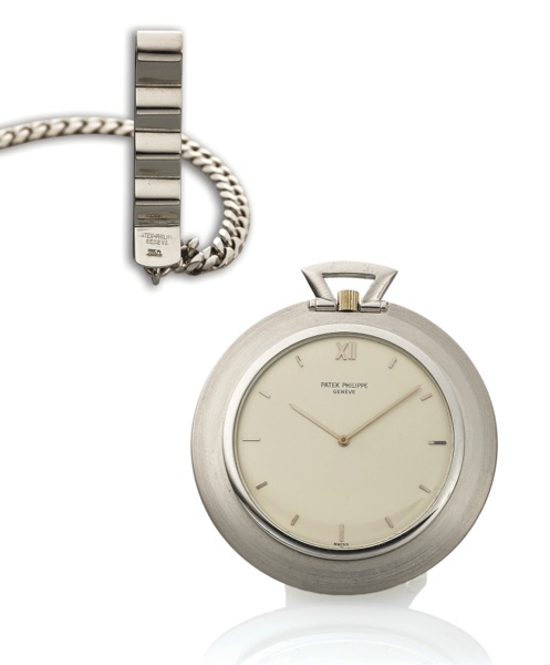 PATEK PHILIPPE REF. 855 WHITE GOLD.Patek Philippe, Genève, No. 1370536, case No. 432960, Ref. 855..Made circa 1970..Very fine and very rare, thin, 18K white gold keyless pocket.watch. Accompanied by a Patek Philippe 18K white gold chain.and fob